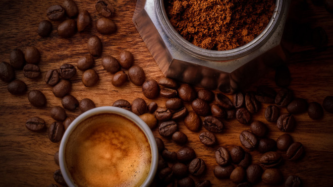 coffee beside coffee beans